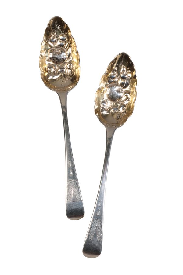 A PAIR OF GEORGE III EMBOSSED SILVER ‘BERRY’ SPOONS