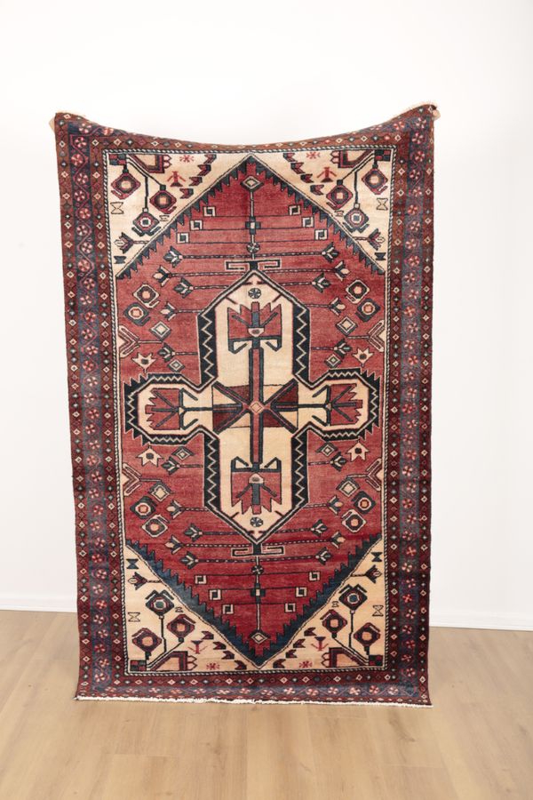 A NORTH WEST PERSIAN HERIZ RUG