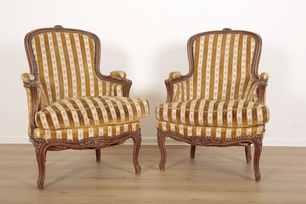 A PAIR OF LOUIS XV STYLE BEECHWOOD ARMCHAIRS