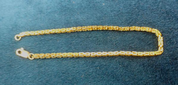 A 9CT GOLD FANCY-LINK BRACELET