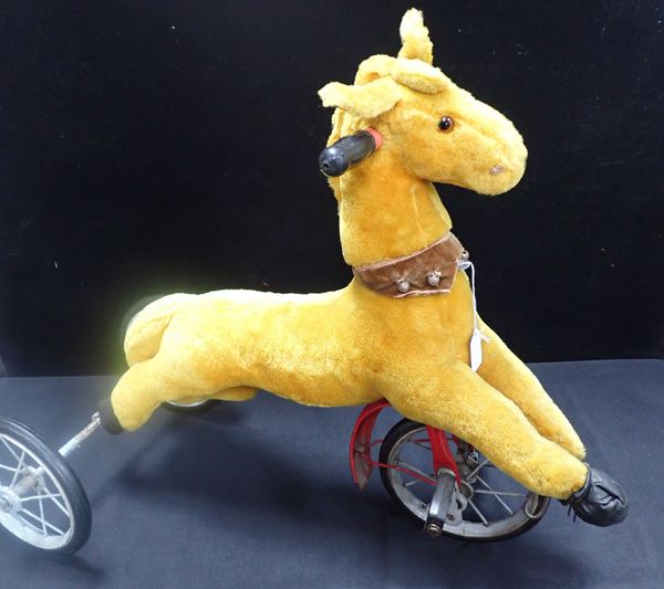 A RIDE -ON PONY BIKE