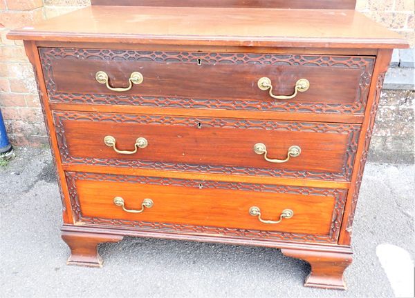 A WARING & GILLOW MAHOGANY CHEST OF THREE DRAWERS