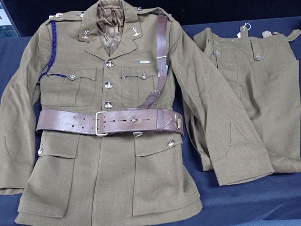 A MILITARY OFFICER'S JACKET AND TROUSERS