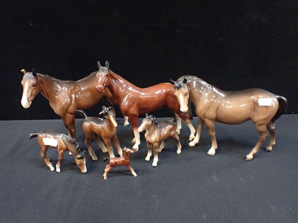 A BESWICK HORSE AND FOALS