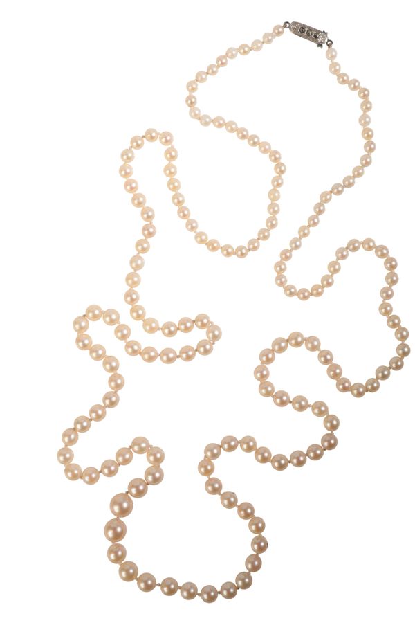 AN OPERA LENGTH CULTURED PEARL NECKLACE