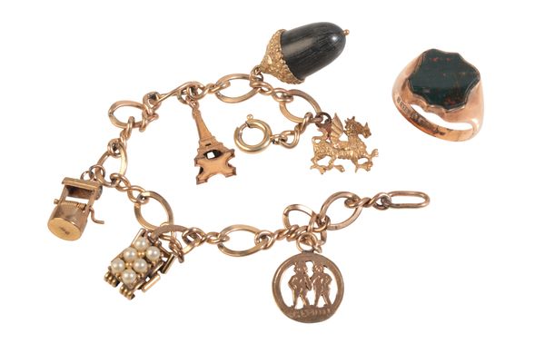 A VINTAGE CHARM BRACELET AND BLOODSTONE SIGNET RING