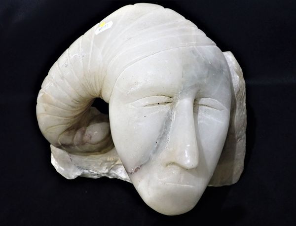 A CARVED ALABASTER BUST OF A GORGON