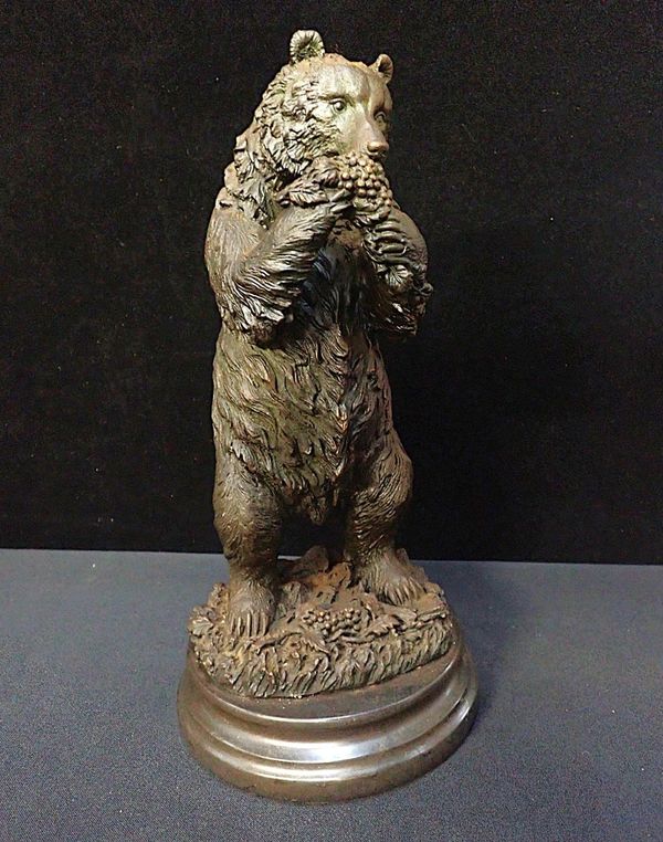 A STANDING BRONZE FIGURE OF A BEAR