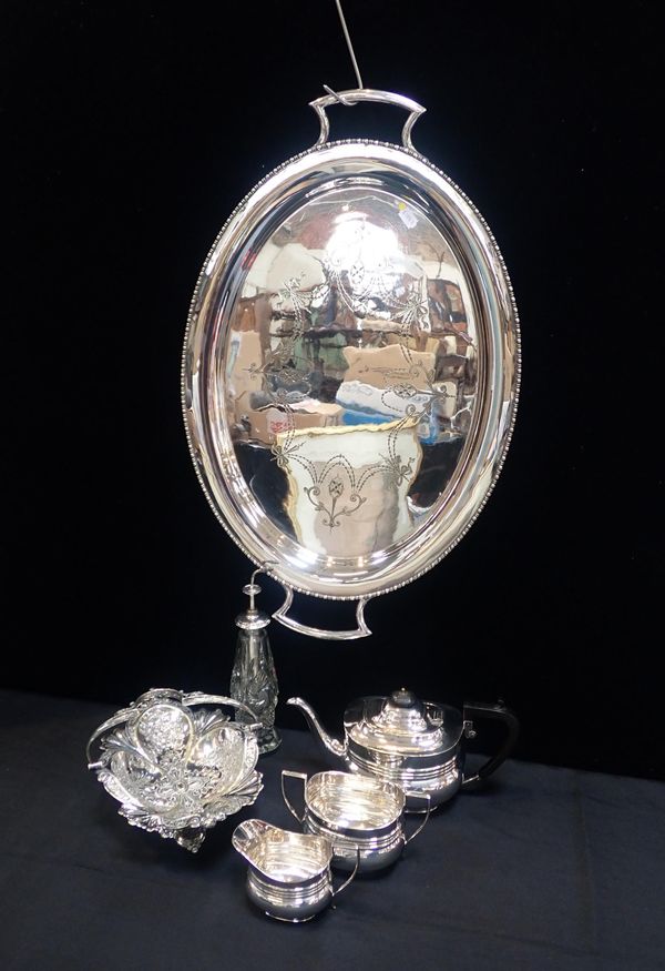AN EDWARDIAN SILVER-PLATED OVAL TRAY