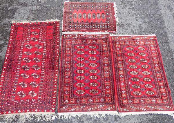 FOUR PAKISTAN BOKHARA RUGS