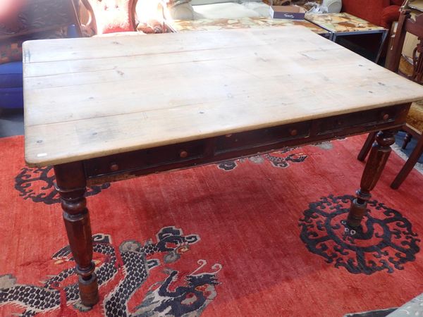 A SCRUB-TOP KITCHEN TABLE
