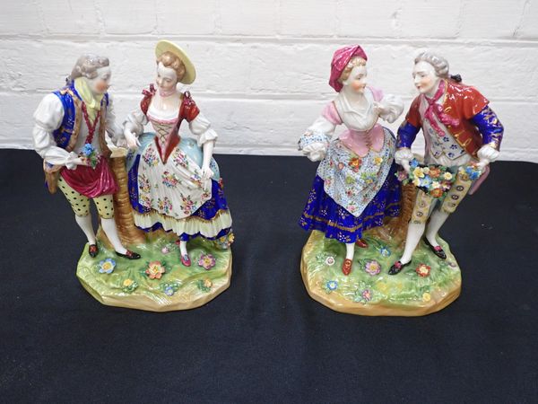 A PAIR OF DRESDEN PORCELAIN FIGURES