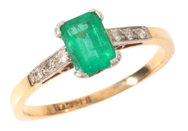 AN EMERALD AND DIAMOND RING