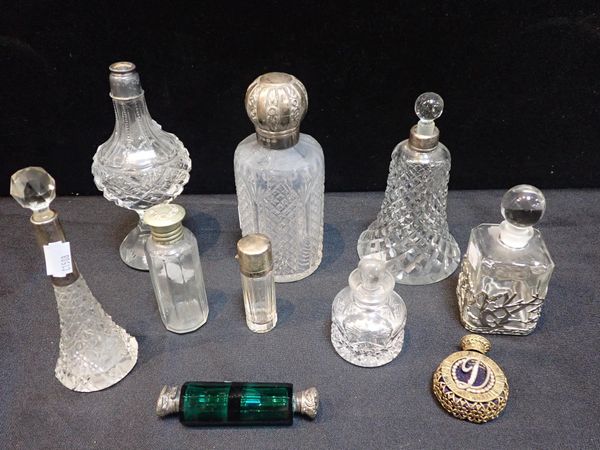 A SILVER-TOPPED SCENT BOTTLE