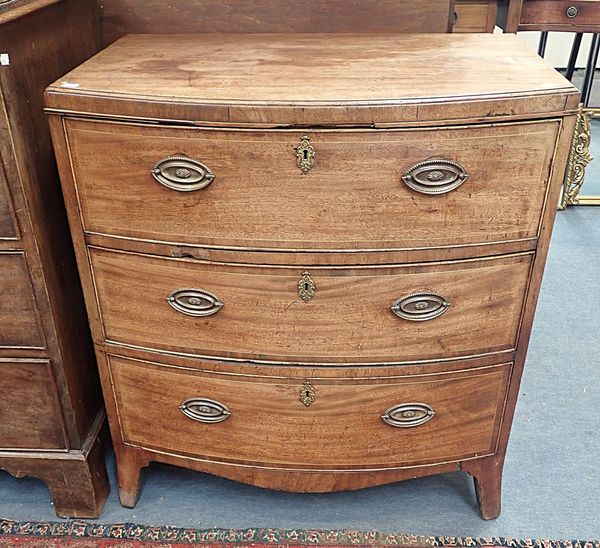 A GEORGE IV MAHOGANY BOW FRONT CHEST OF DRAWERS