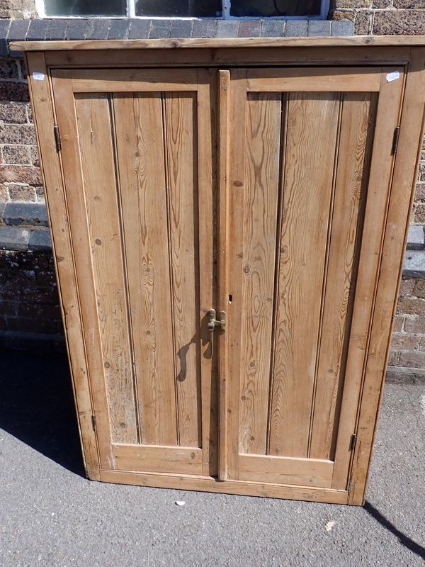 A 19th CENTURY PINE CUPBOARD