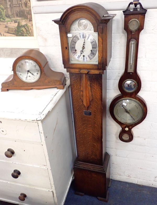 A 1930s OAK CASED GRANDMOTHER CLOCK