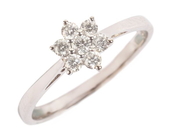 A DIAMOND DAISY RING