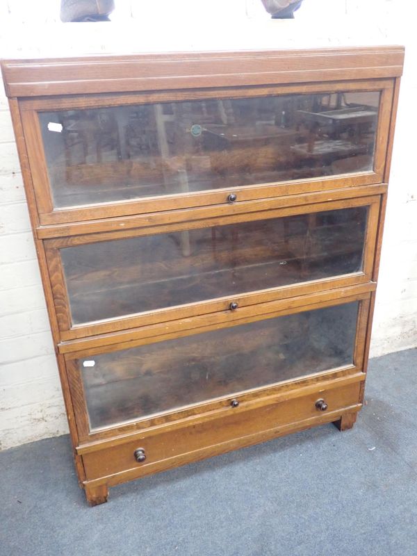 AN OAK GLOBE-WERNICKE BOOKCASE