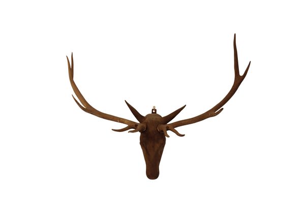 A CARVED WOOD AND ANTLER MOUNTED STAG'S HEAD WALL TROPHY,