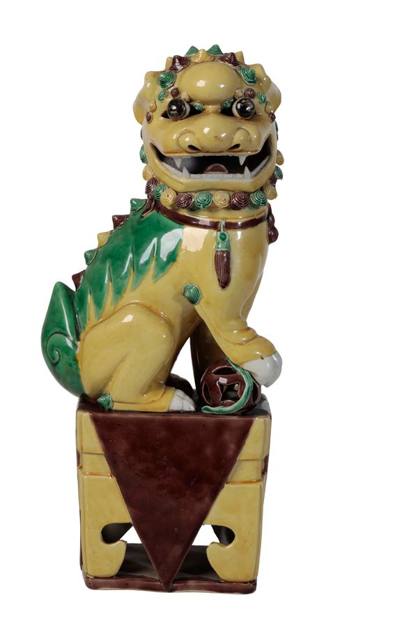 LARGE SANCAI-GLAZE POTTERY LION DOG, QING DYNASTY, 19TH CENTURY