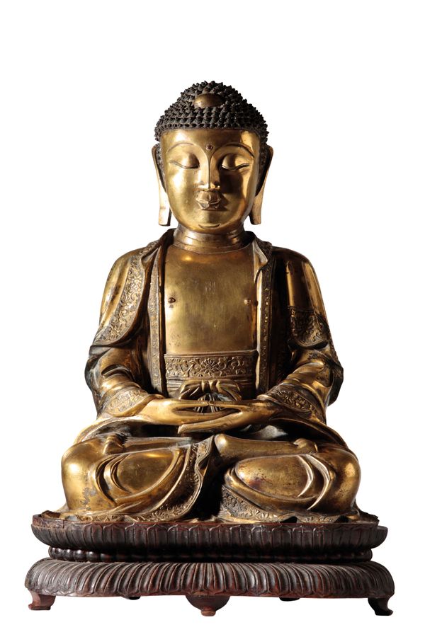 FINE GILT-BRONZE FIGURE OF SEATED SHAKYAMUNI, MING DYNASTY, 16TH CENTURY