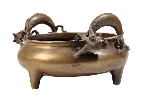 GOLD-SPLASH BRONZE TRIPOD 'DRAGON' CENSER, QING DYNASTY, 18TH CENTURY