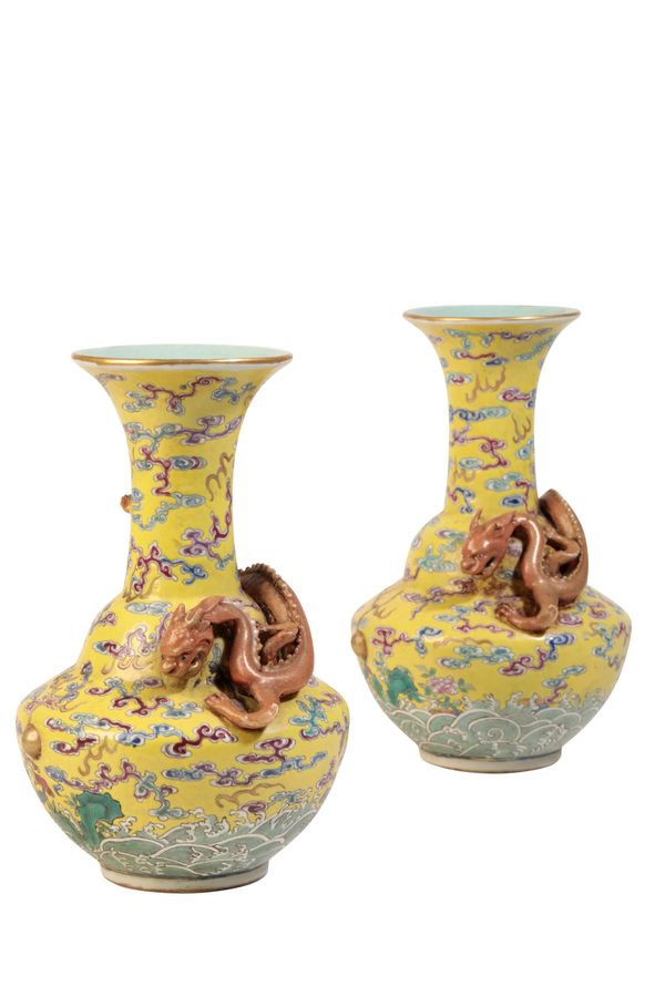 PAIR OF FAMILLE ROSE YELLOW-GROUND VASES, QIANLONG SEAL MARKS BUT 19TH CENTURY