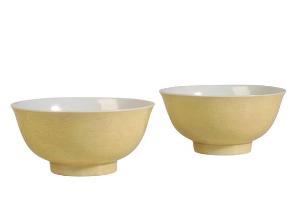 PAIR OF YELLOW-GROUND INCISED 'DRAGON' BOWLS, KANGXI SIX CHARACTER MARK AND OF THE PERIOD