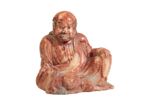 CARVED SOAPSTONE FIGURE OF A LOHAN, QING DYANSTY, 18TH CENTURY