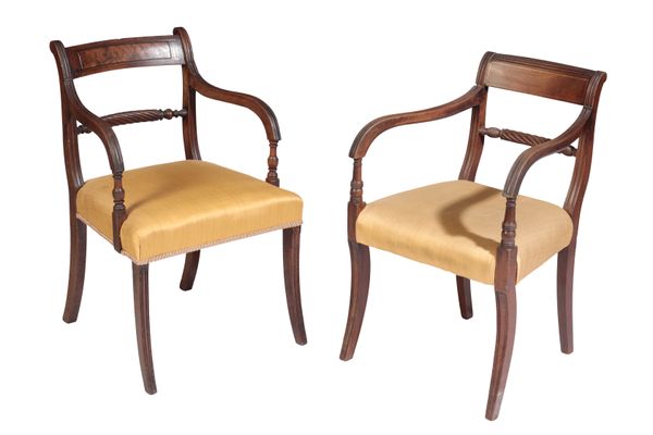 A MATCHED SET OF FOUR REGENCY MAHOGANY ELBOW CHAIRS,