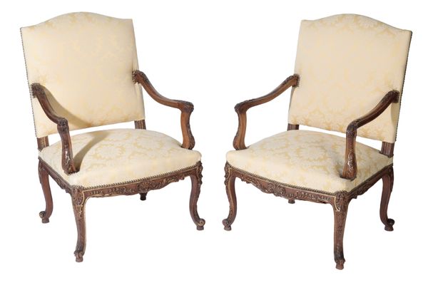 PAIR OF CARVED AND PARCEL GILT BEECH AND UPHOLSTERED CANAPES IN LOUIS XV TASTE