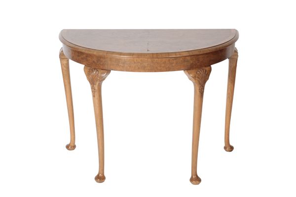 A BURR WALNUT AND FEATHER BANDED DEMI-LUNE SIDE TABLE IN GEORGE II STYLE,