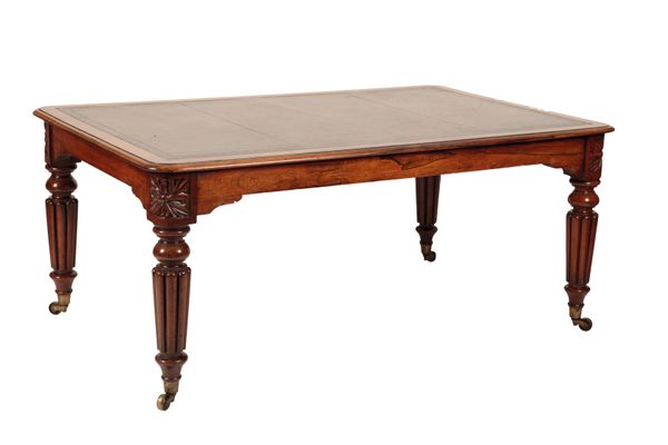 ROSEWOOD AND LEATHER INSET LIBRARY TABLE IN THE MANNER OF WORK BY GILLOW OF LANCASTER