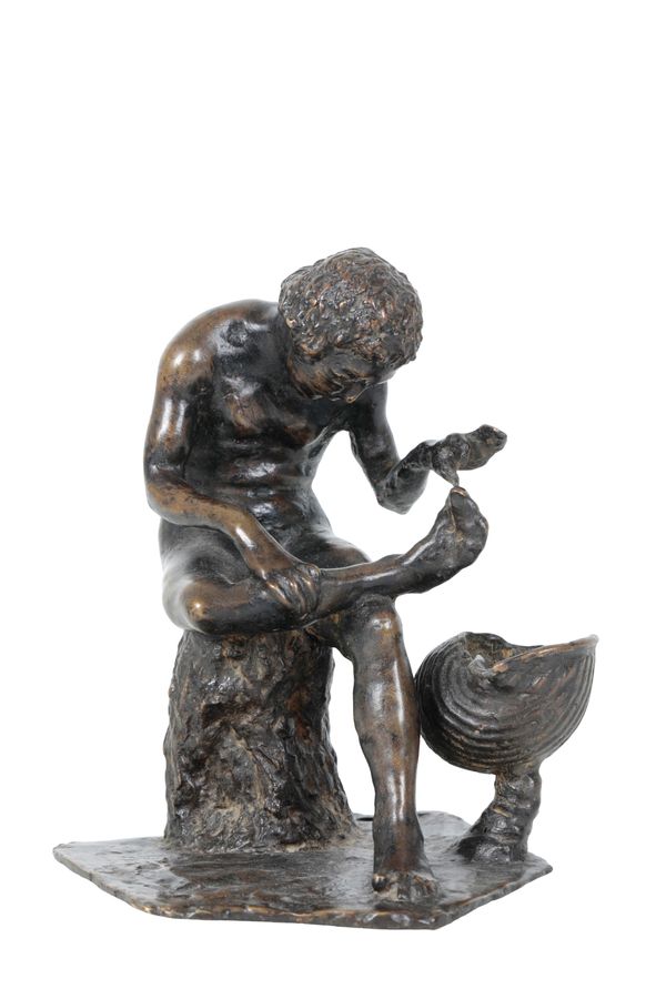 A PATINATED BRONZE MODEL OF THE SPINARIO,