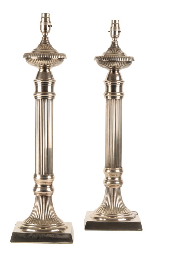 A PAIR OF SILVER PLATED COLUMNAR TABLE LAMPS,