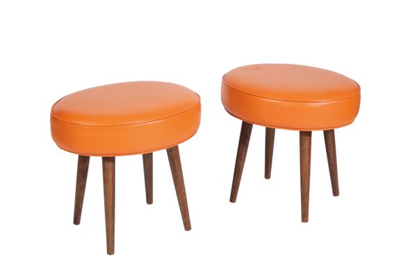 A PAIR OF OVAL CUSHIONED STOOLS