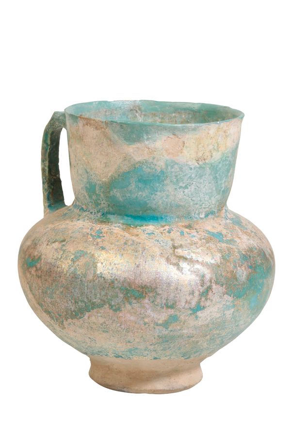 A KASHAN TURQUOISE-GLAZE EWER, possibly 12th Century