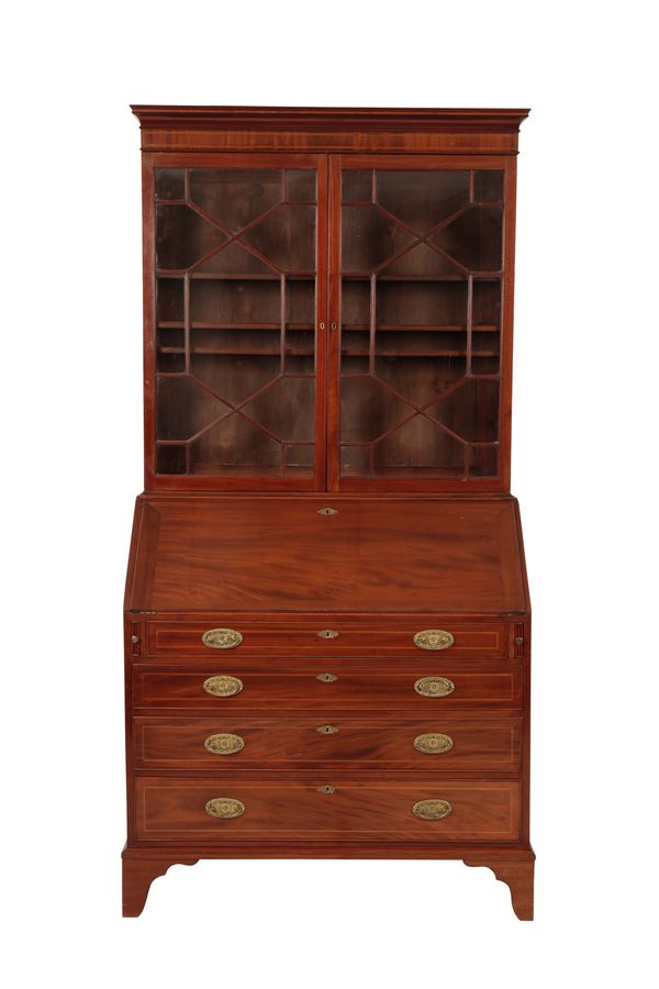 A MAHOGANY AND GLAZED BUREAU BOOKCASE IN GEORGE III STYLE,