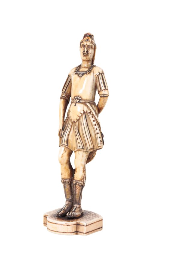 A CONTINENTAL CARVED IVORY MODEL OF A ROMAN IN RENAISSANCE TASTE,