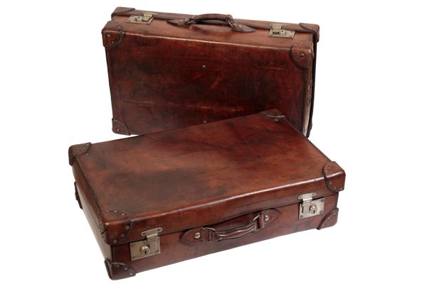 TWO LARGE LEATHER SUITCASES