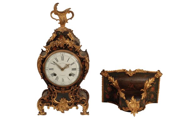 A  LOUIS XV STYLE MANTEL CLOCK