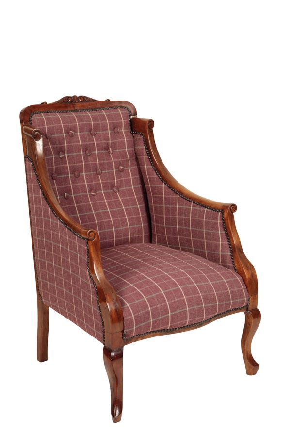 A VICTORIAN CARVED MAHOGANY AND UPHOLSTERED ARMCHAIR,