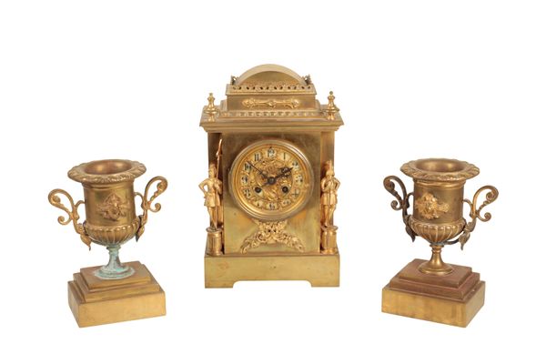 A VICTORIAN FRENCH BRASS CASED MANTEL CLOCK AND GARNITURE