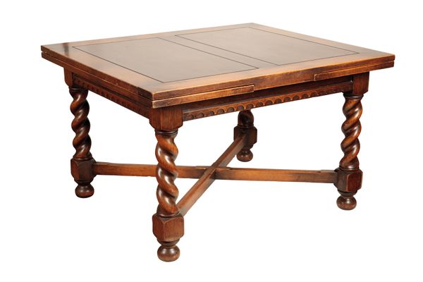 AN OAK DRAW LEAF DINING TABLE IN 17TH CENTURY STYLE,