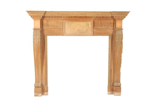 A CARVED PINE AND COMPOSITION CHIMNEYPIECE IN THE STYLE OF WILLIAM KENT,