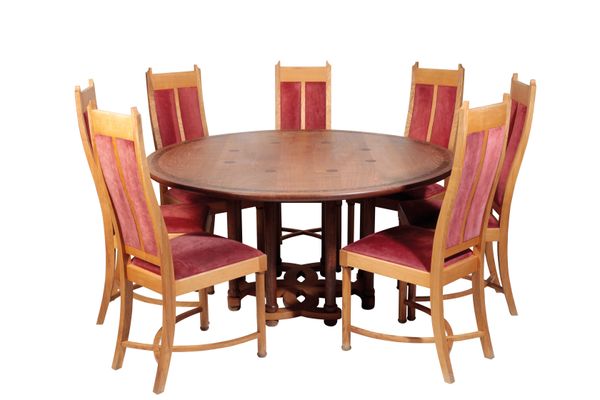ADRIAN KING FOR WAYWOOD FURNITURE: A CIRCULAR DINING TABLE AND EIGHT CHAIRS