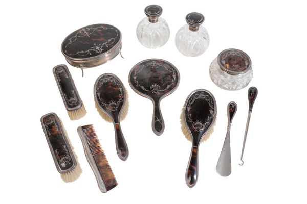 A GROUP OF SILVER MOUNTED DRESSING TABLE ITEMS