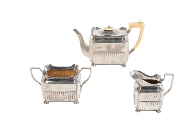 A LATE VICTORIAN SILVER THREE PIECE TEA SERVICE BY HENRY STRATFORD,