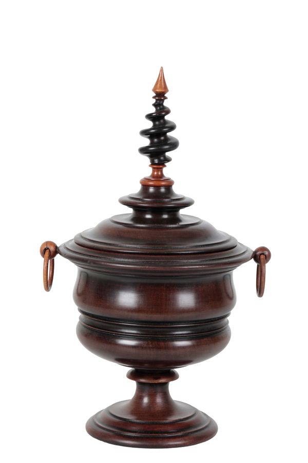 A FLEMISH TURNED MAHOGANY URN AND COVER,